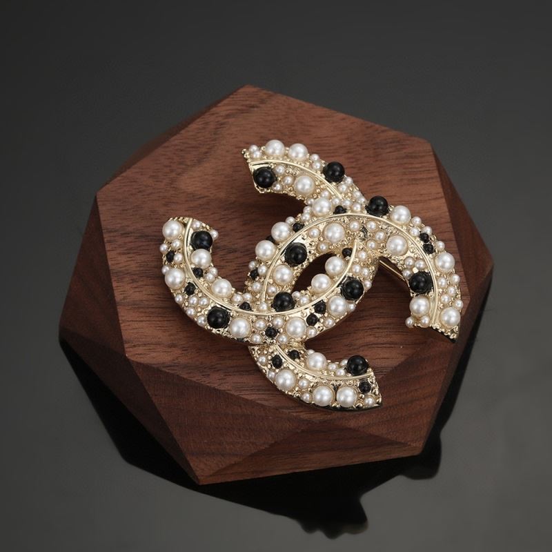 Ch**el brooches